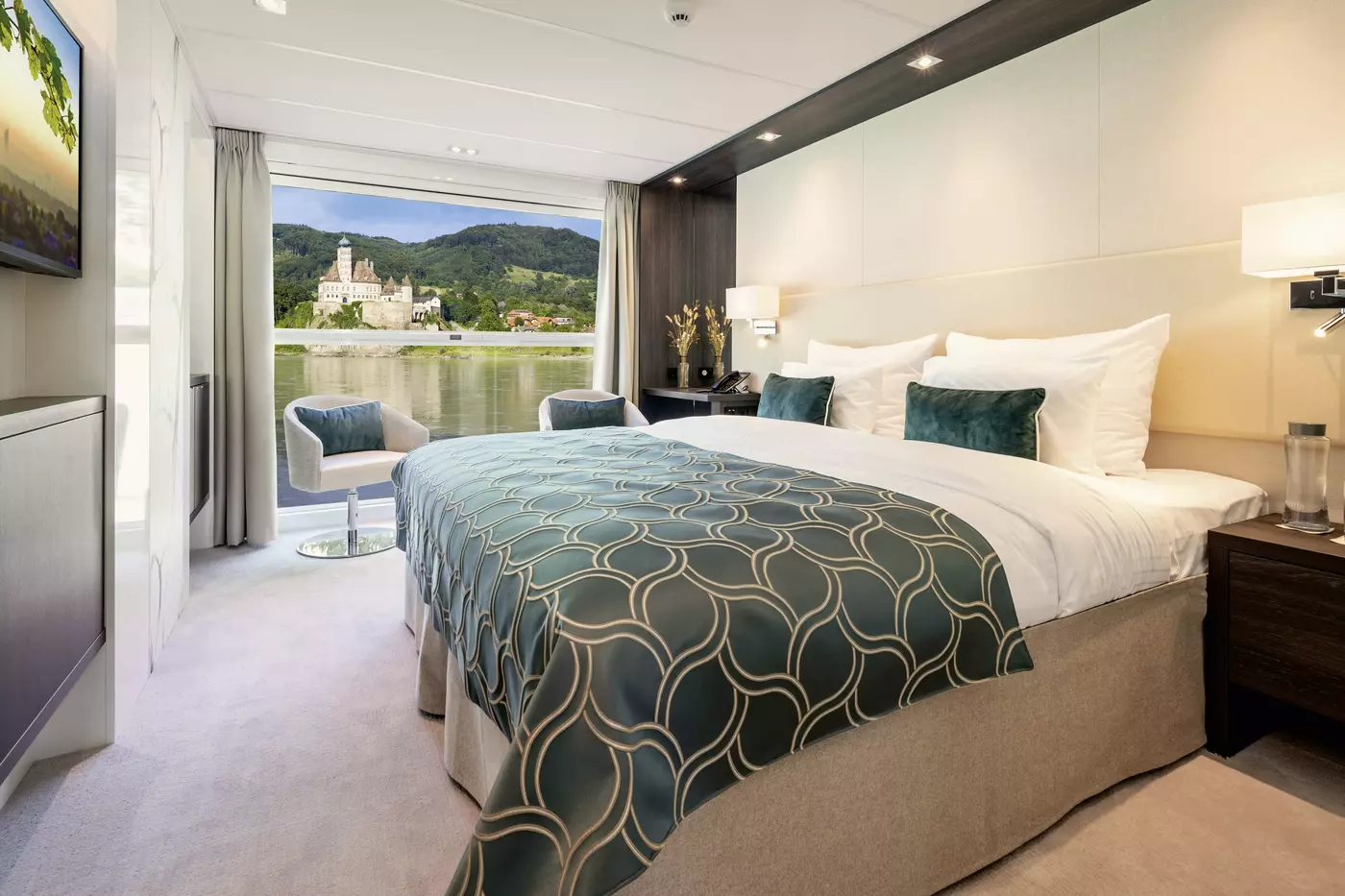 A Strauss and Mozart Deck cabin on the AMADEUS Cara, with a floor-to-ceiling drop-down panoramic window